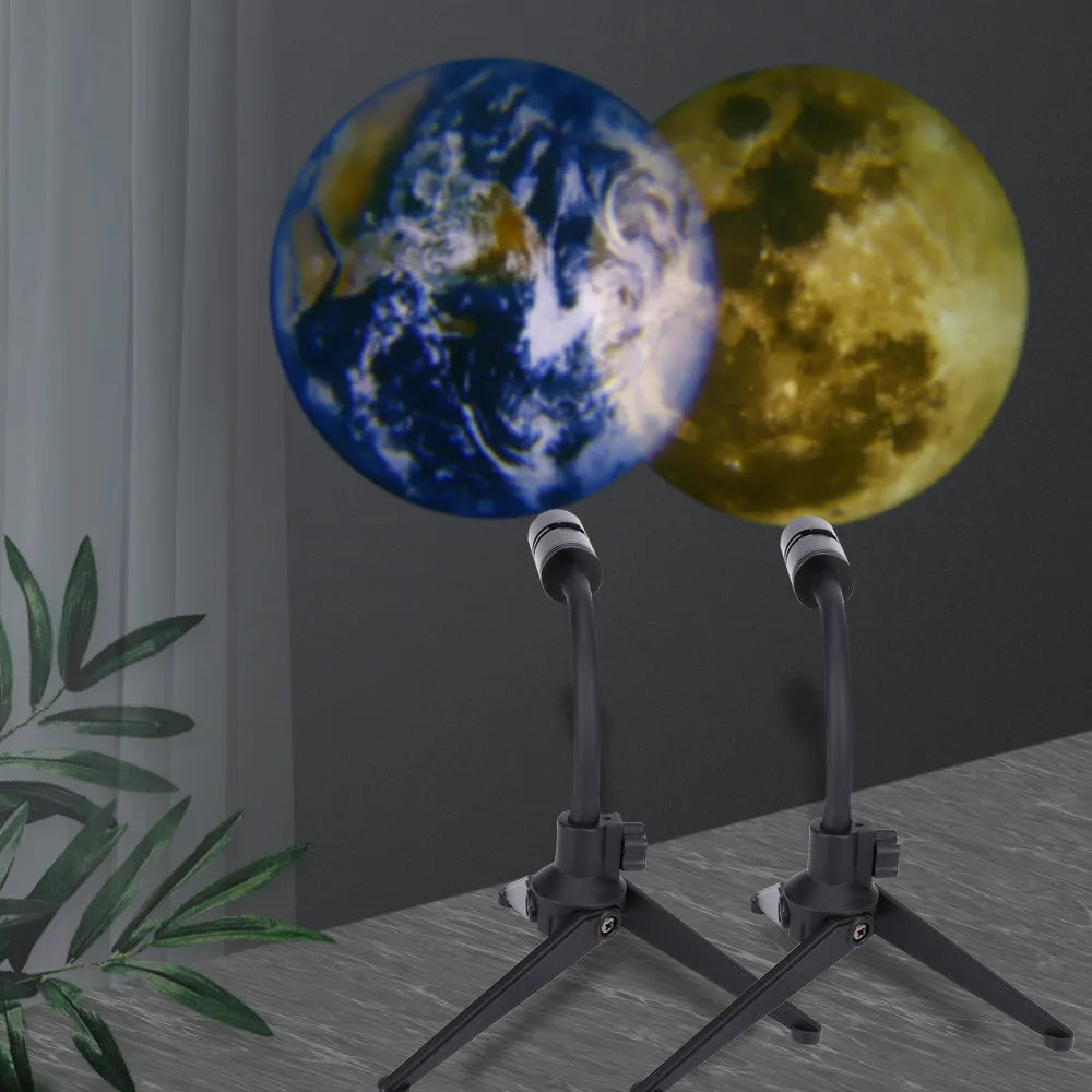 Star projector showing earth and moon projections with adjustable bracket and USB cable