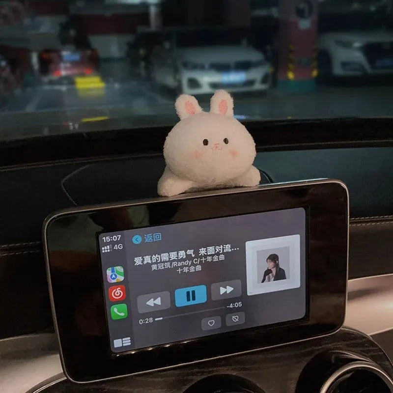 Soft fabric plush doll car decoration in cute bear and bunny cartoon designs.