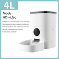 White smart pet automatic feeder with 6 litre capacity, stainless steel tray, and digital timer on a kitchen counter