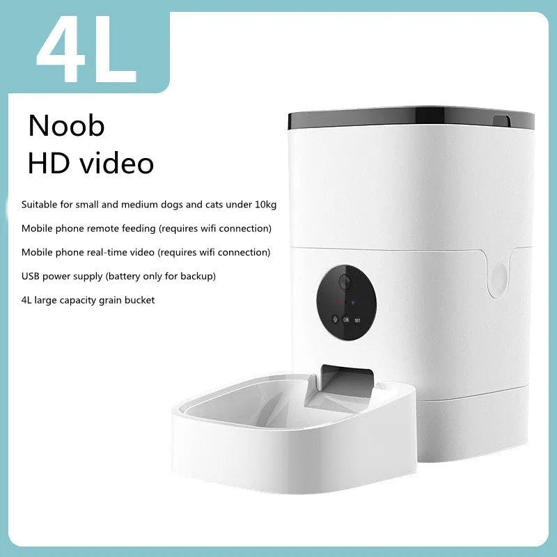 White smart pet automatic feeder with 6 litre capacity, stainless steel tray, and digital timer on a kitchen counter