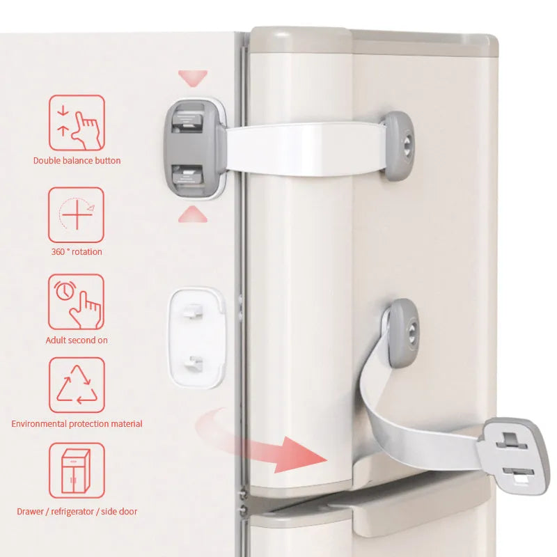 Grey and green adjustable child safety cabinet locks with adhesive backing on a kitchen drawer.