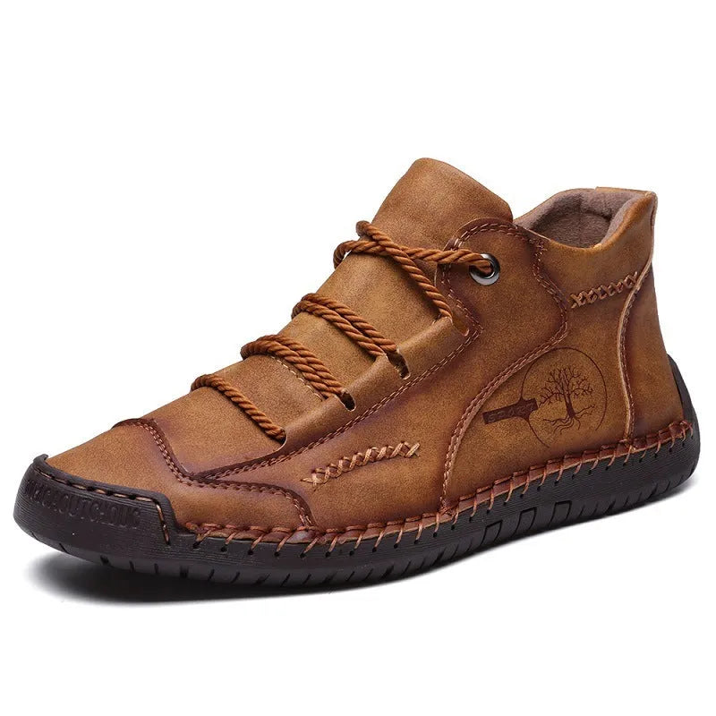 Men's brown leather high-top boots with round toe and flat rubber soles