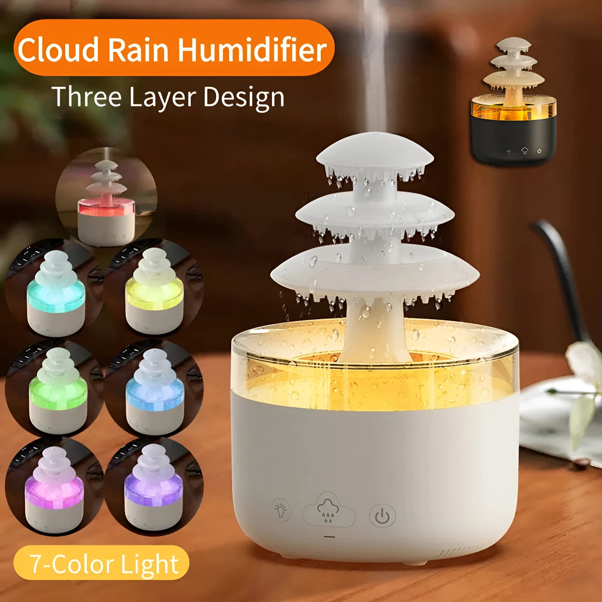 White cloud-shaped USB humidifier and essential oil diffuser with colourful mood lights on a wooden table.