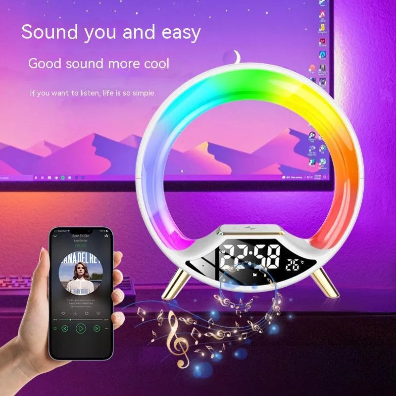 O Light three-in-one wireless charging Bluetooth speaker and night light on a bedside table.