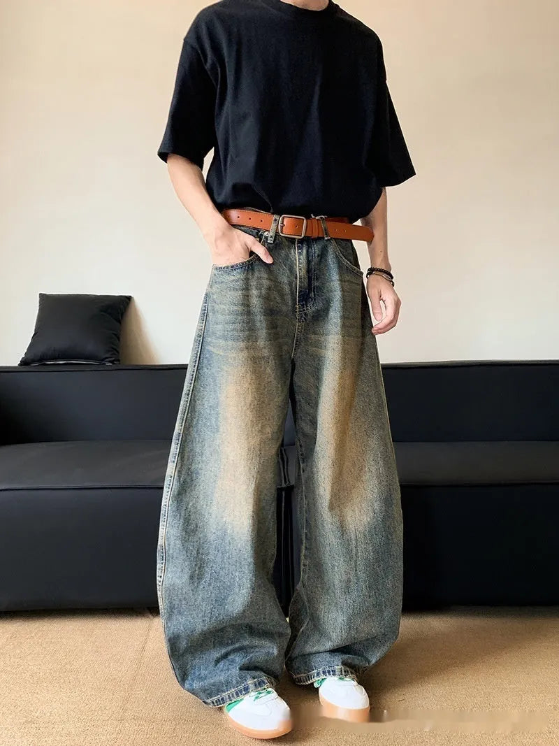 Men's retro blue jeans with distressed machete detailing and slimming wide-leg cut on mid waist design