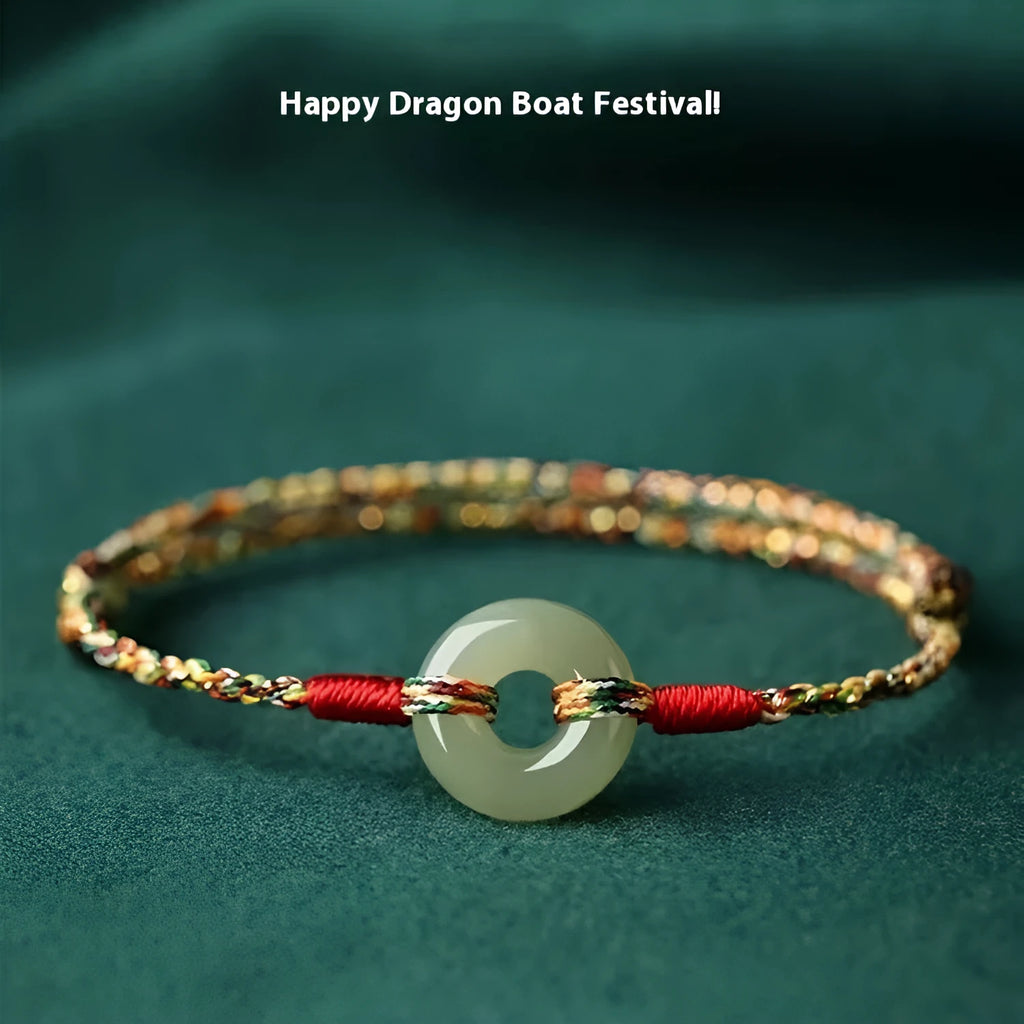 Colourful braided rope bracelet with silver peace buckle on woven wristband