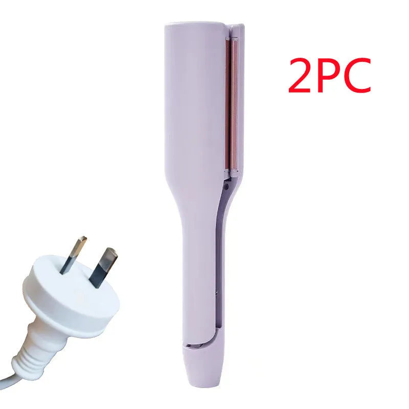 32mm pink hair curling iron with ceramic barrel and 4 heat settings on white background