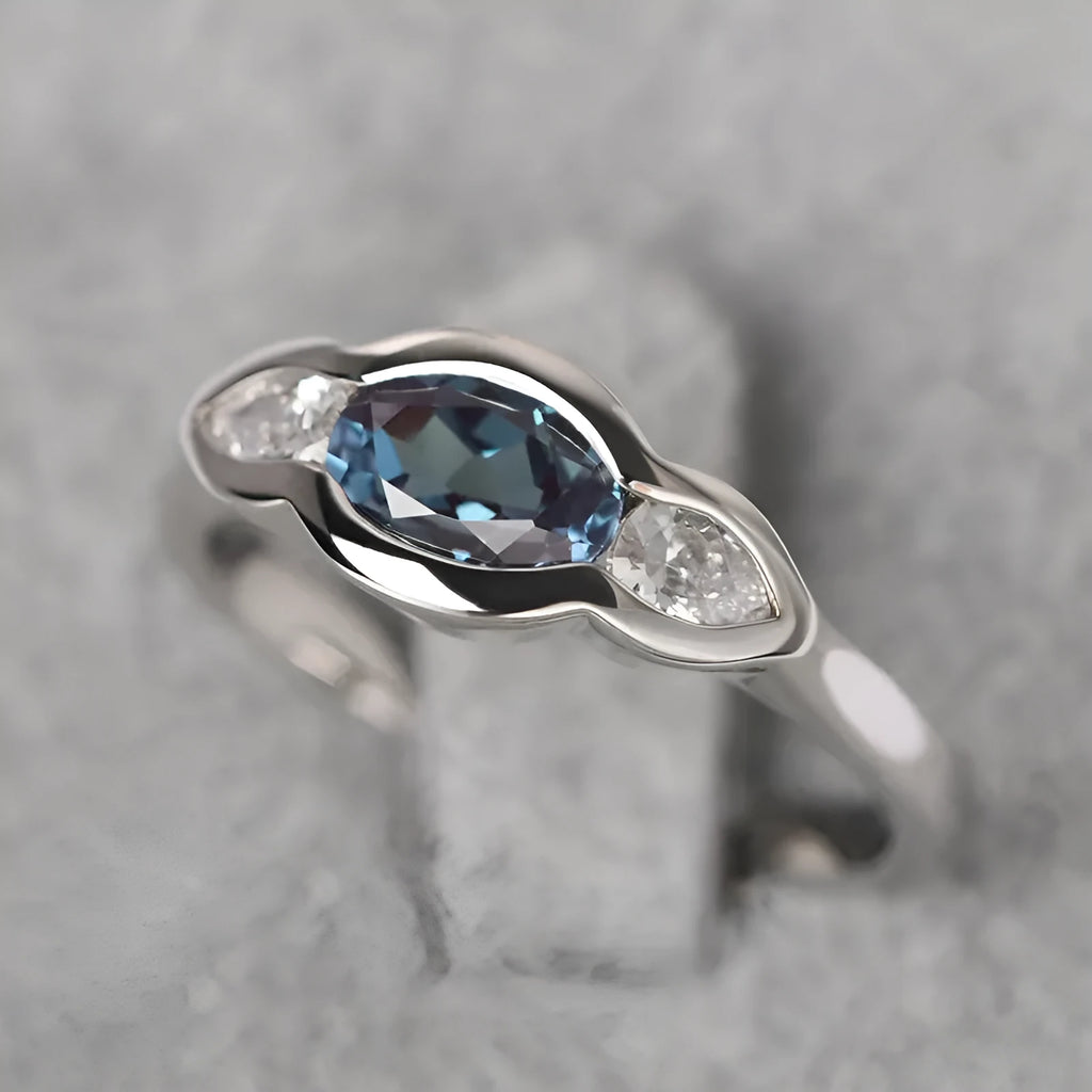Women's geometric ellipse copper ring with inlaid zircon stone in white gold colour.