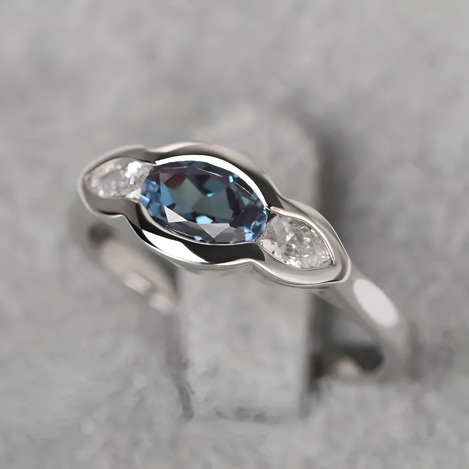 Women's geometric ellipse copper ring with inlaid zircon stone in white gold colour.