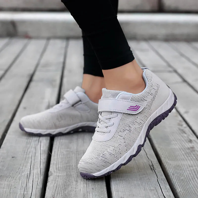 Women's low top wedge heel shoes with mesh upper and Velcro fastening in purple colour