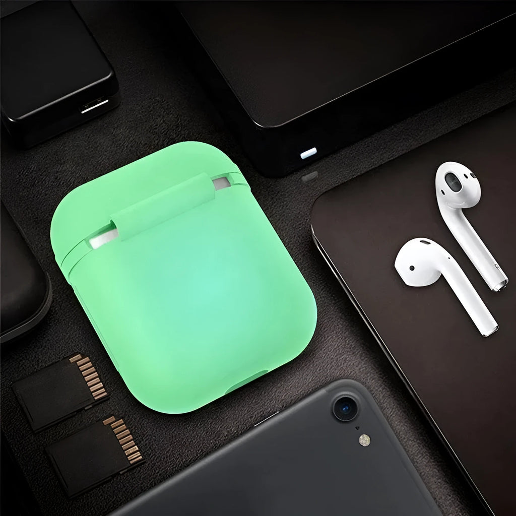 Luminous solid colour silicone flip-top protective case for AirPods on a white background.