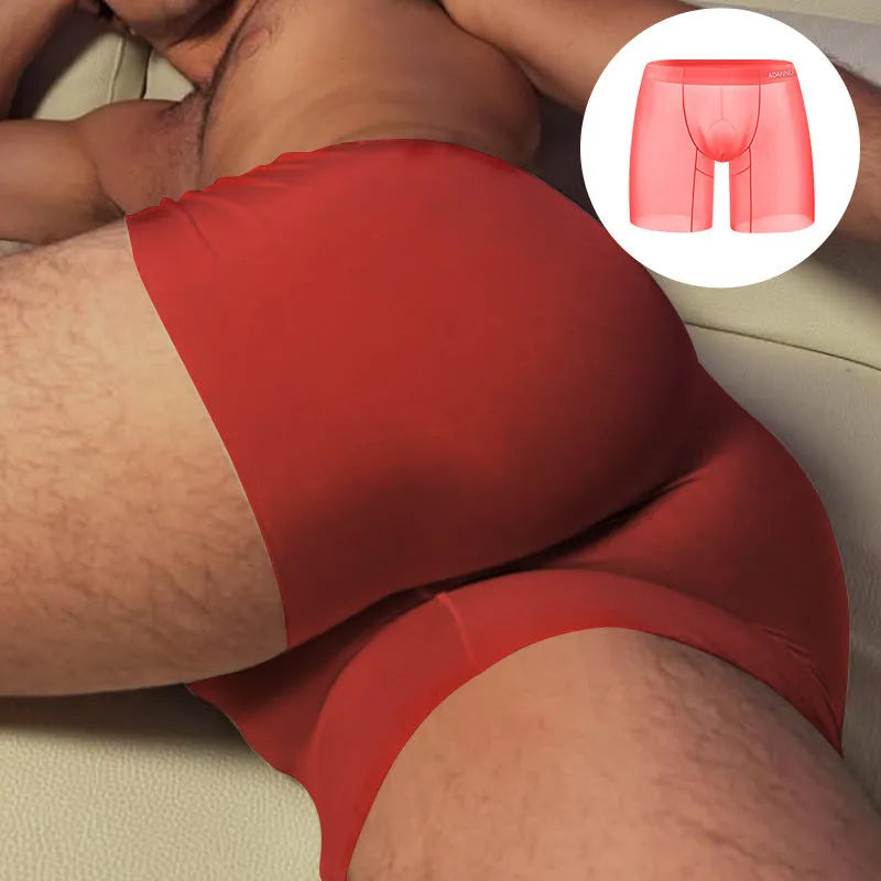 Orange men's seamless nylon boxer shorts with low waist and body-shaping fit on a white background.