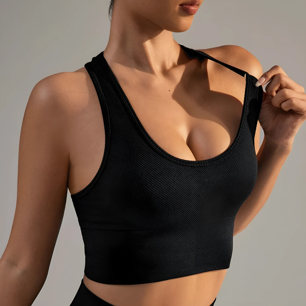 Black sports bra with cross-back design and full cup coverage