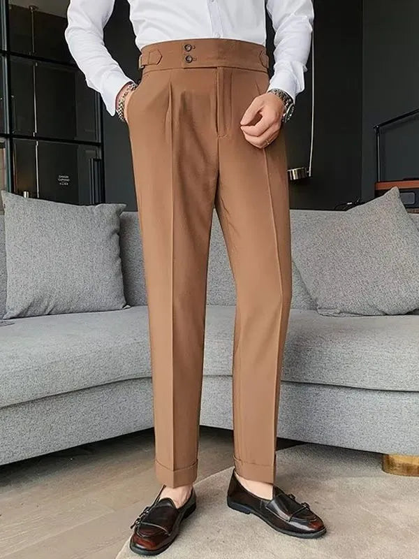 Men's high-waist straight-leg trousers in neutral colours on a hanger.
