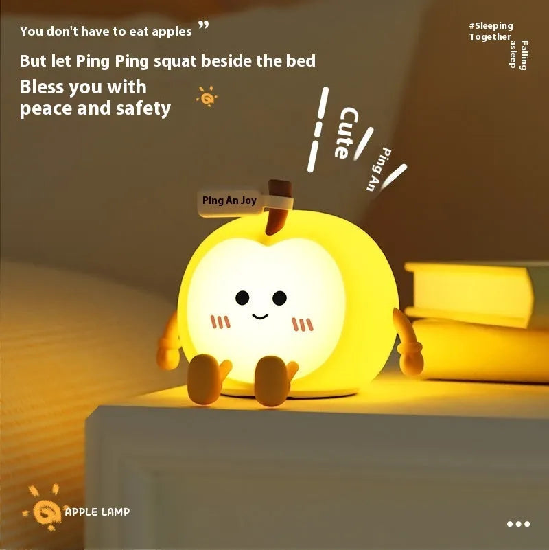 Qian'an Xile night light with geometric stereo design, USB charging, and yellow LED glow on a desktop