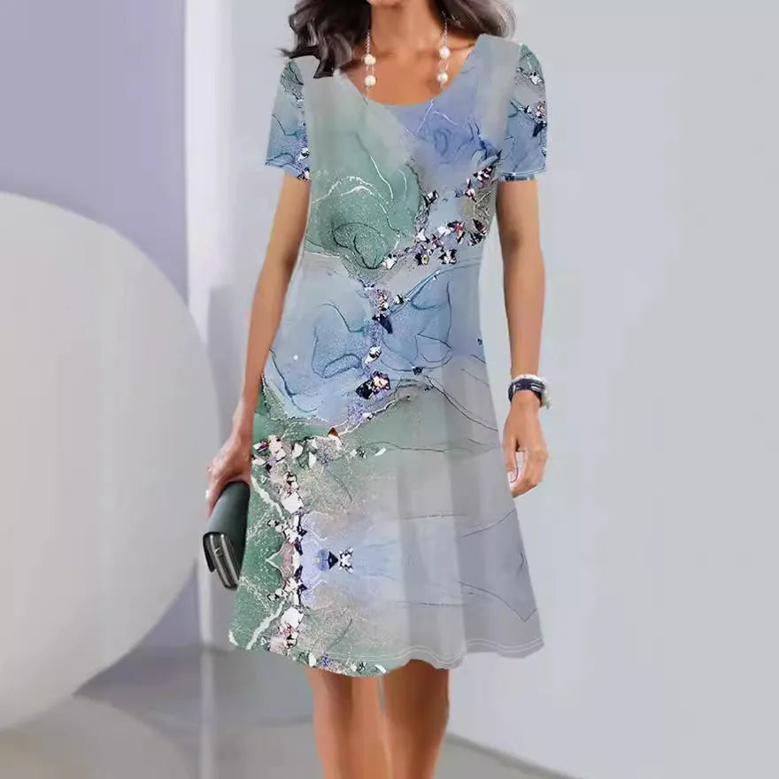 Light blue floral print Ice Silk summer dress with round neck and short sleeves on a mannequin.