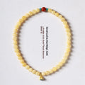 Handmade yellow jade double ring bracelet with lotus seedpod pattern and 8mm 6mm beads