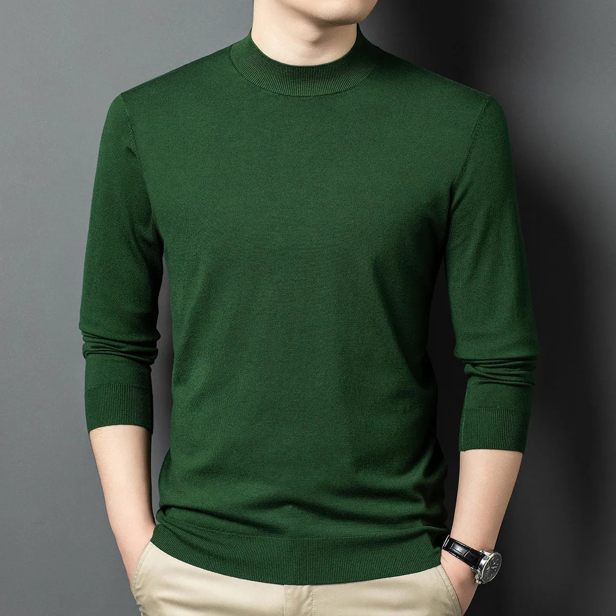 Men's grey round neck wool and mulberry silk blend pullover sweater with long sleeves.