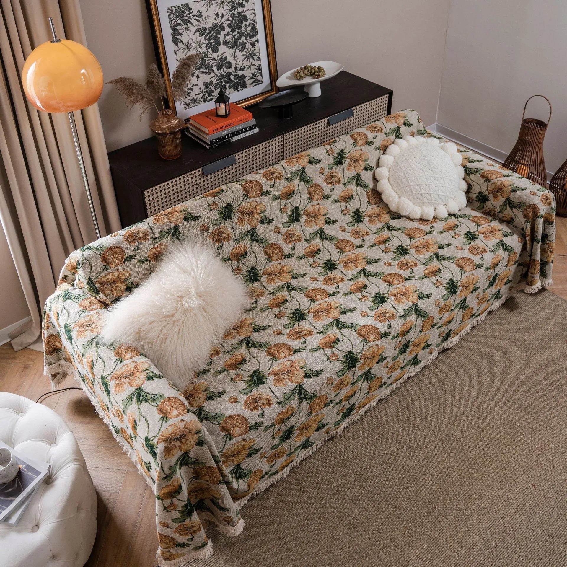 American country retro jacquard sofa cover in a cherry pattern on a white background, draped over a sofa.