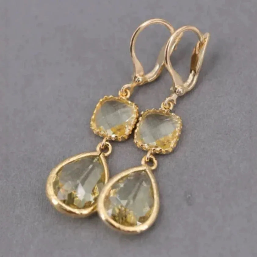 Gold retro earrings with long crystal fringe and geometric water droplet design