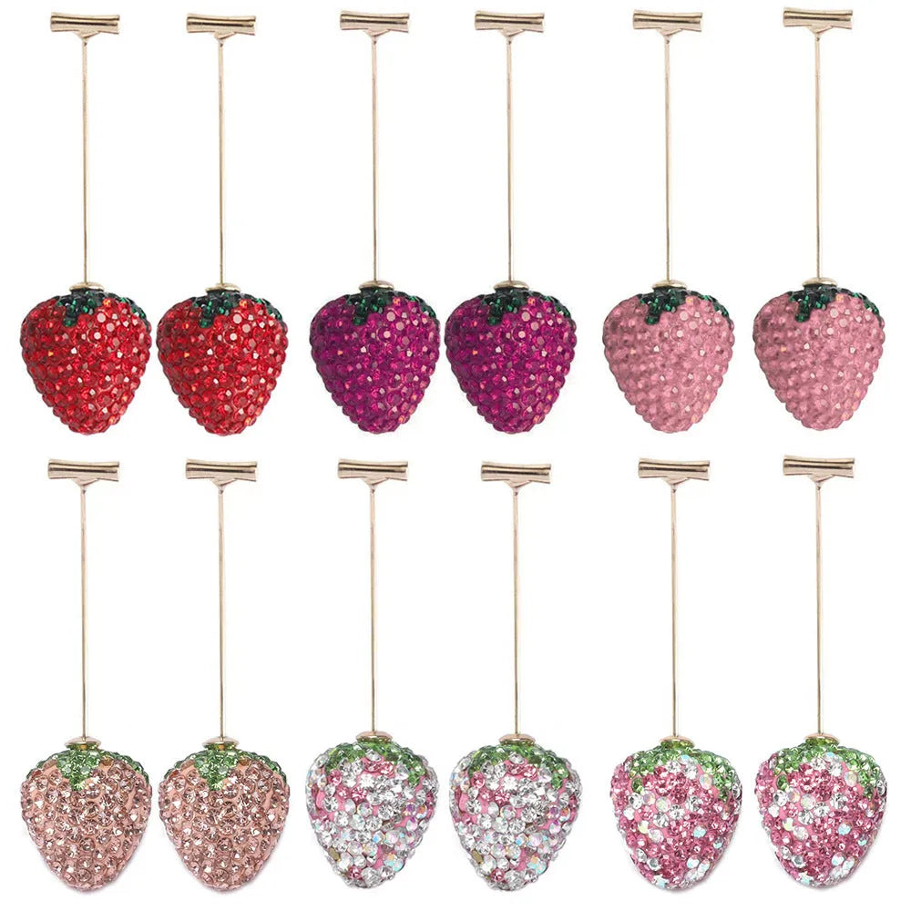 Geometric zinc alloy strawberry earrings for women in red with spot drill detail.