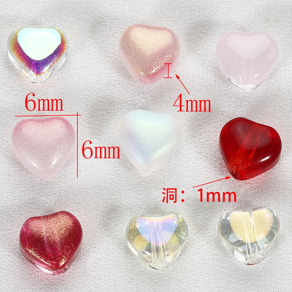 20 heart-patterned Czech beads in aurora colours including purple, blue rose, and white