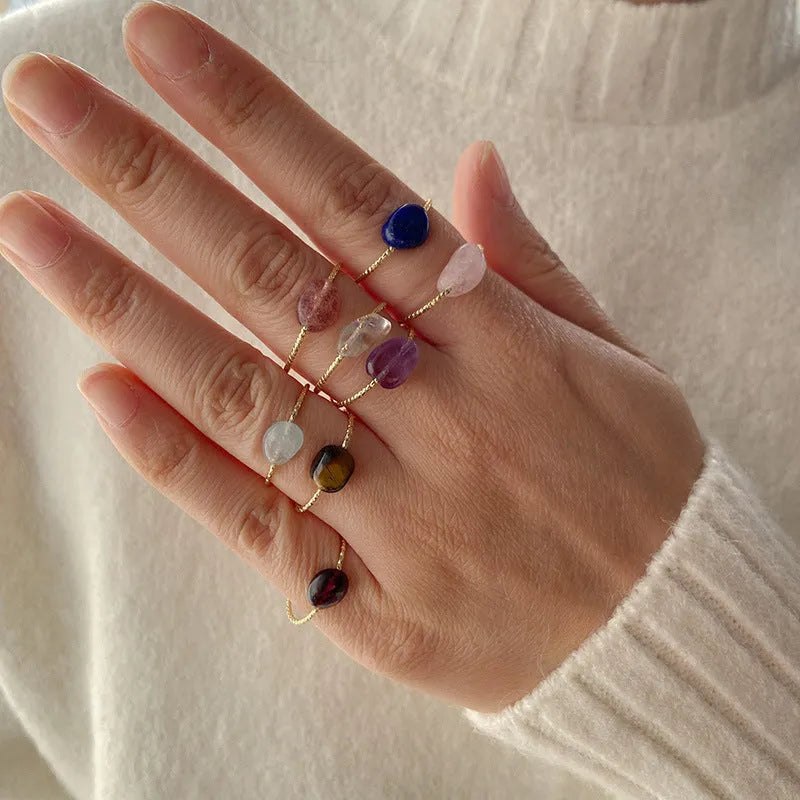 Geometric women's ring with a coloured agate stone in a modern setting.