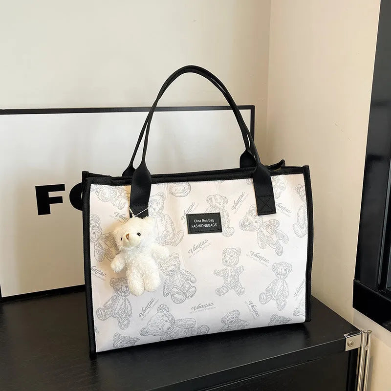 Women's soft canvas tote bag in horizontal square shape with rhombus pattern detail