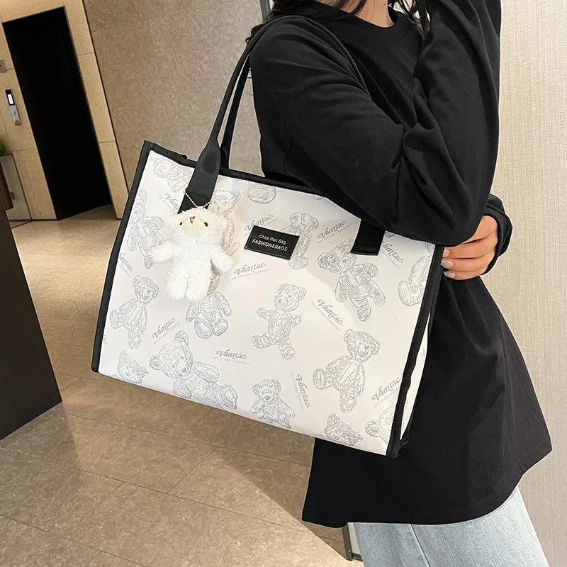 Women's soft canvas tote bag in horizontal square shape with rhombus pattern detail
