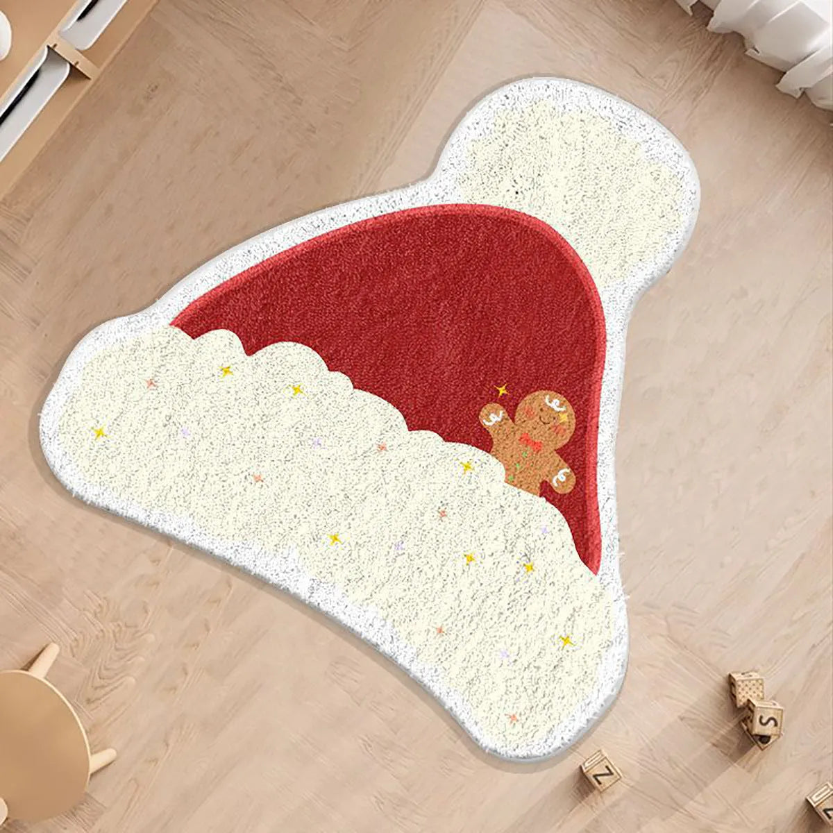 Round alien-shaped Christmas floor mat with festive patterns in imitation cashmere fabric.
