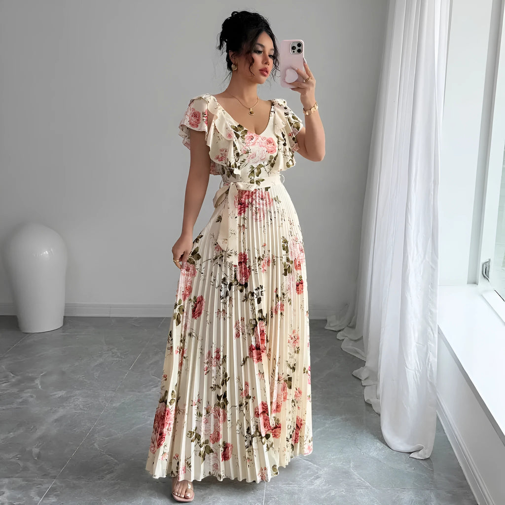 Apricot floral print women's dress with V-neck, ruffle sleeves, and a high-waisted A-line skirt.