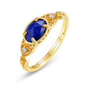 Geometric silver alloy ring with deep blue lapis lazuli stone in elliptical setting
