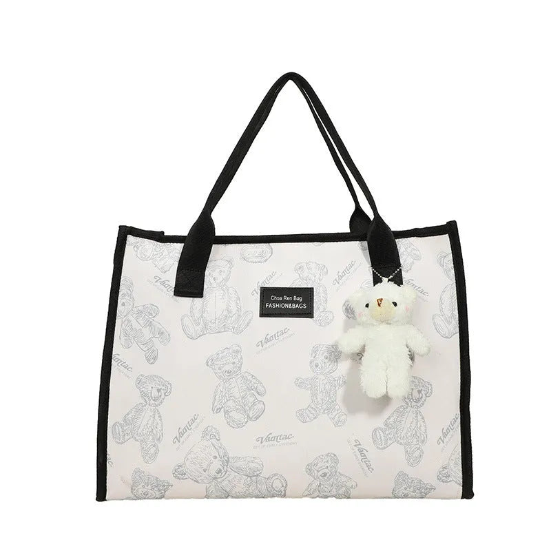 Women's soft canvas tote bag in horizontal square shape with rhombus pattern detail