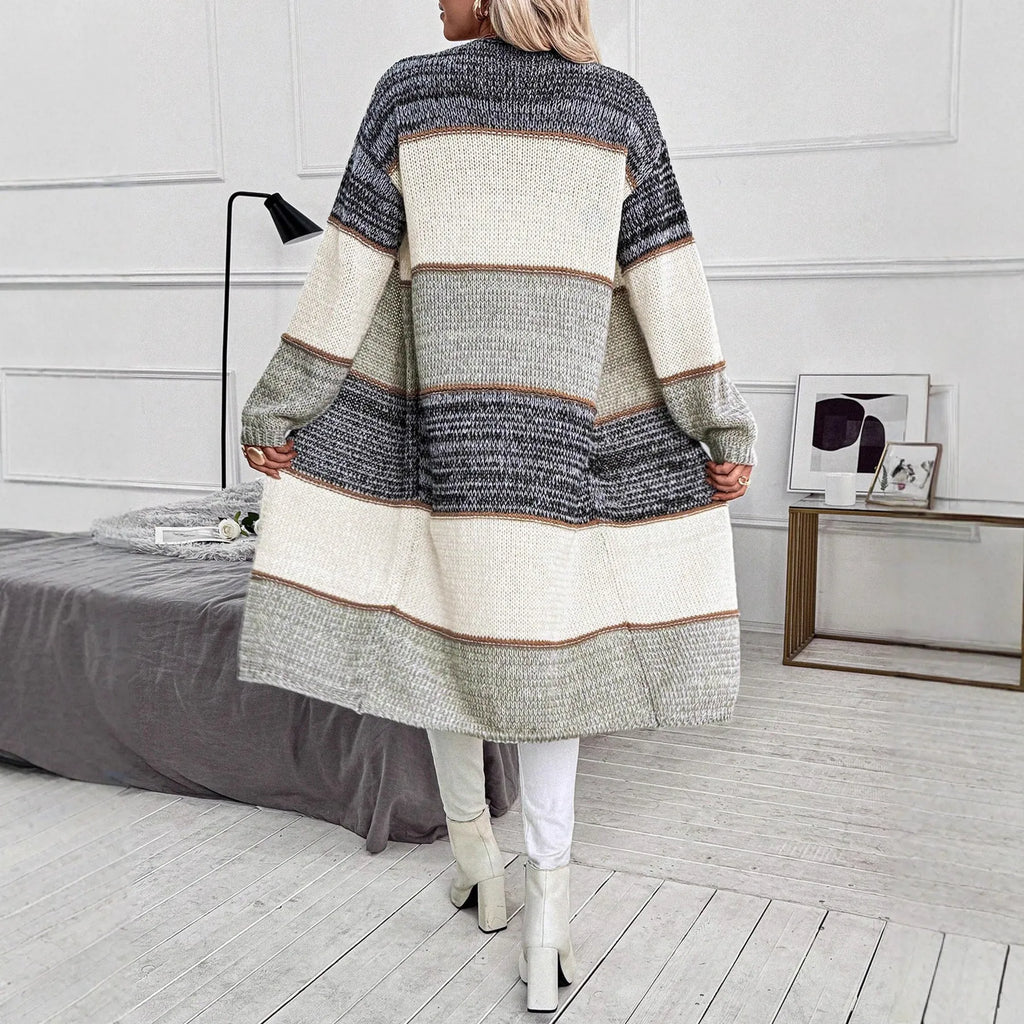 Grey striped knitted women's cardigan with loose fit and long sleeves