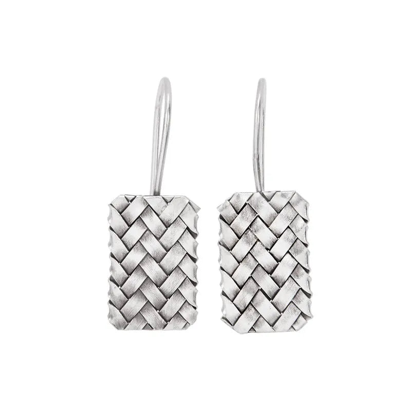 Silver geometric plaid pattern drop earrings with woven diamond design
