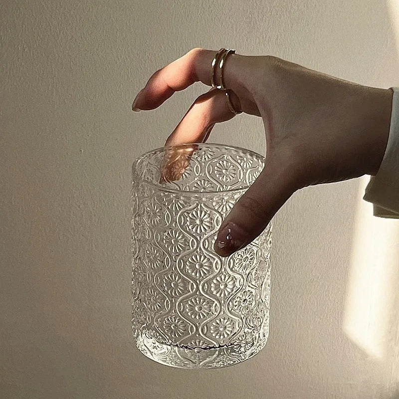 A begonia-carved straight round glass water cup in a solid colour, shown in short 250ml and tall 380ml sizes.
