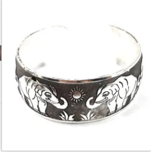 Open carved Miao silver bracelet with ethnic design and Roman shape in alloy