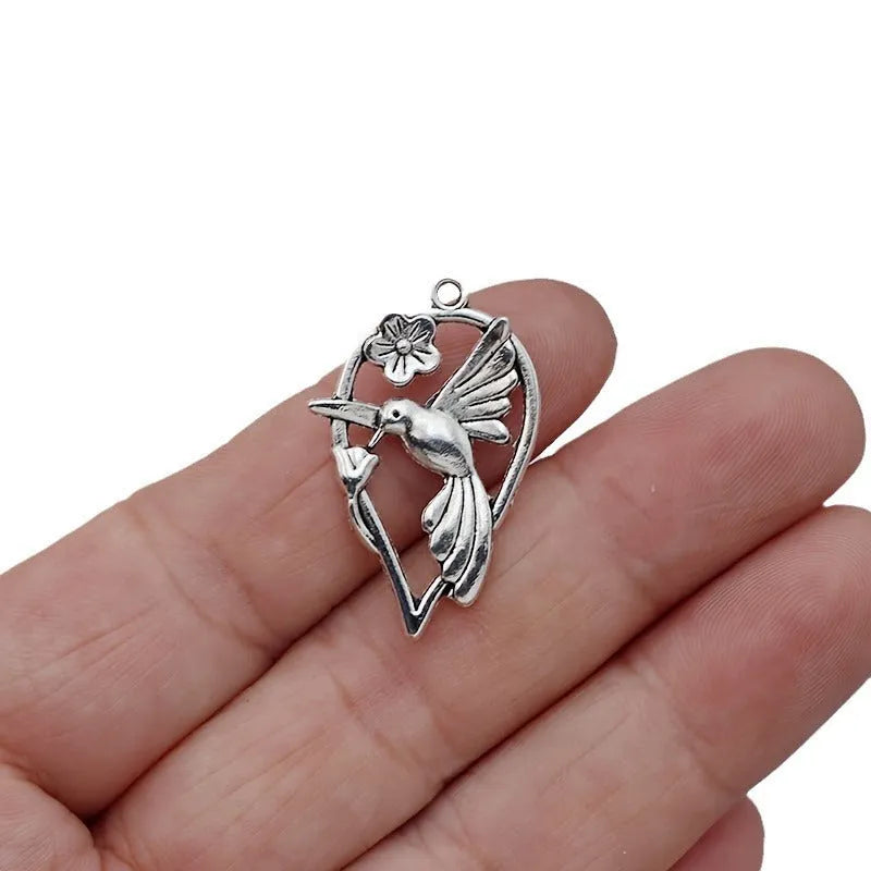 Alloy Magpie bird charm pendant with electroplated P234 colour finish for DIY jewellery.