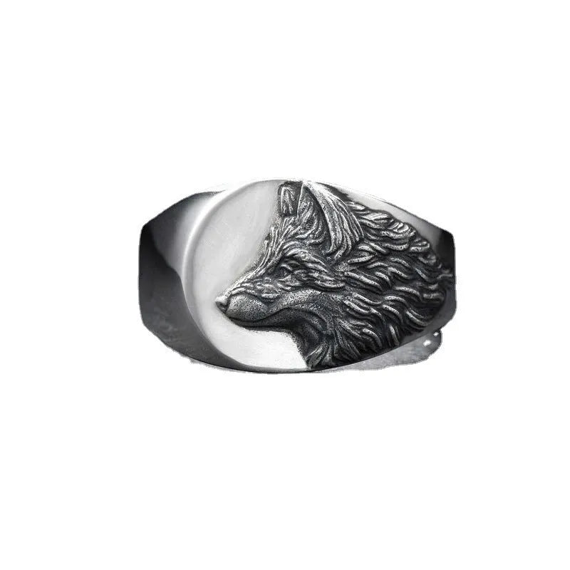 Men's silver alloy ring with a geometric wolf head design on a signet ring band.