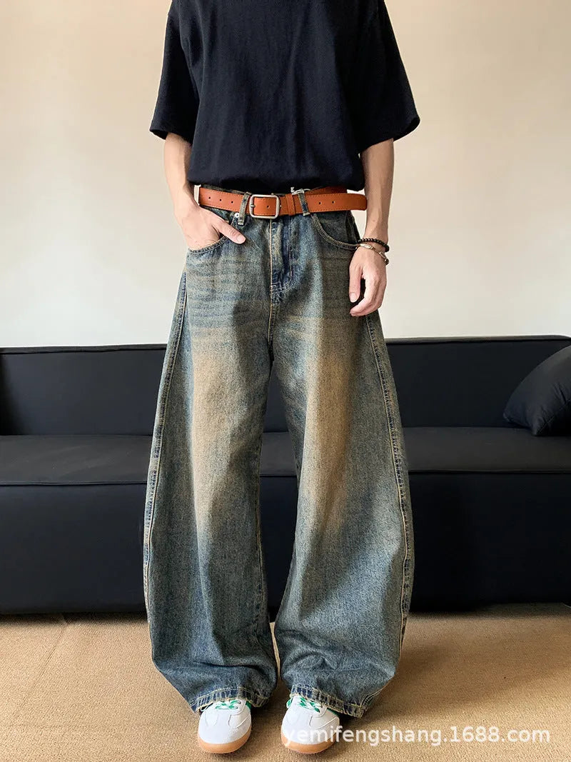 Men's retro blue jeans with distressed machete detailing and slimming wide-leg cut on mid waist design