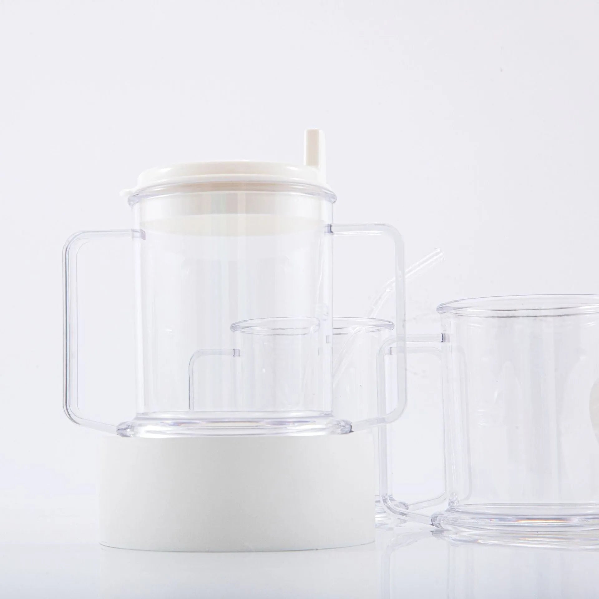 Transparent spill-proof drinking cup showing PP construction with modern simplicity design