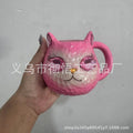 Clear resin Cat Cup ornament in purple, green, blue, and pink colour options on display.