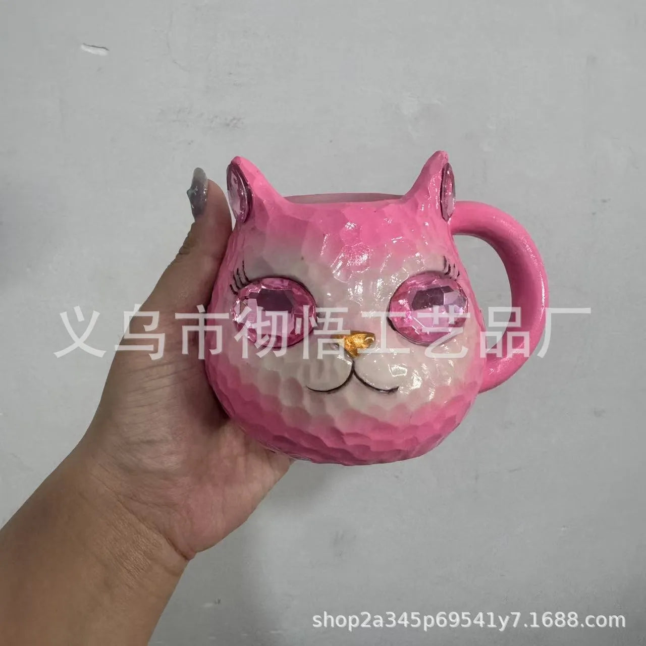 Clear resin Cat Cup ornament in purple, green, blue, and pink colour options on display.