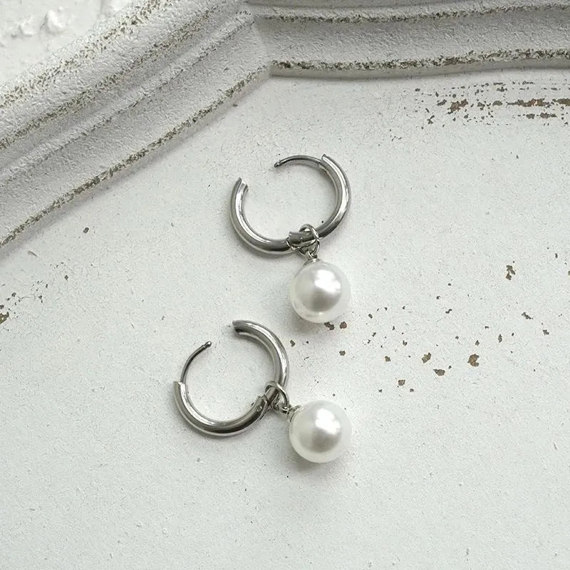 Women's alloy pearl geometric earrings with titanium steel posts and round design
