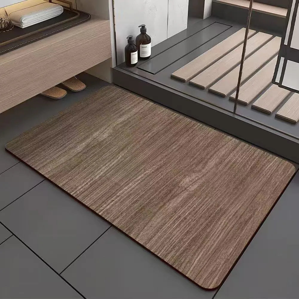Square American wood grain patterned diatom ooze bathroom floor mat on a tiled floor.