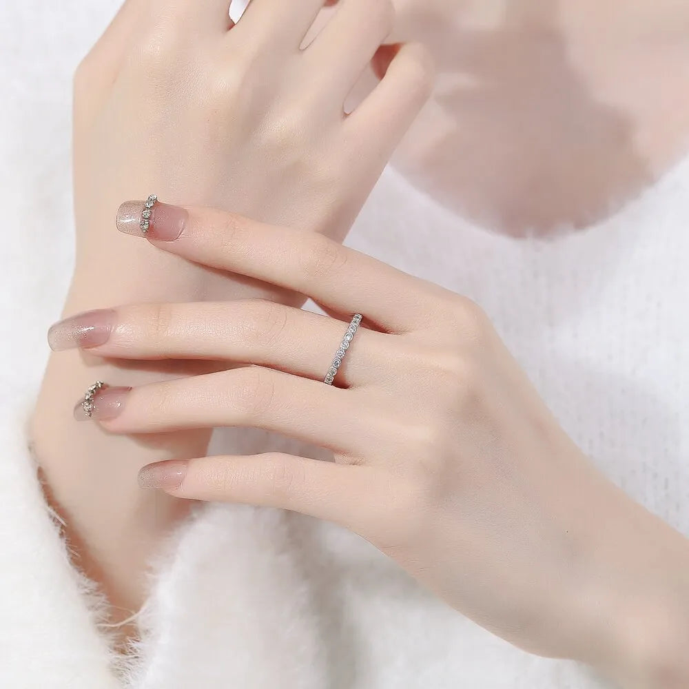 Simple geometric open-mouth ring for women in copper with white gold or yellow gold electroplated finish.