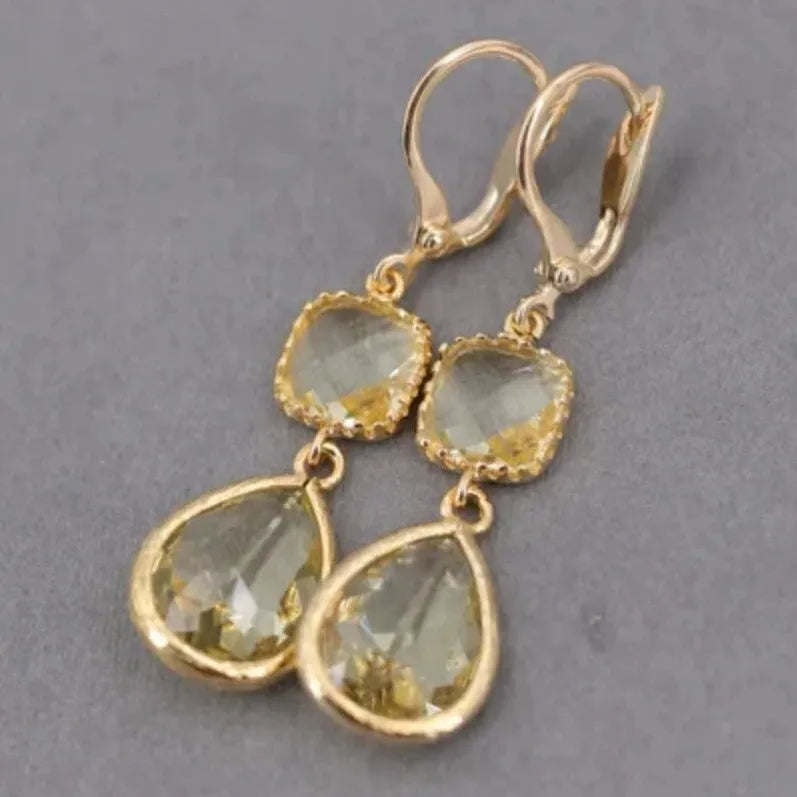 Gold retro earrings with long crystal fringe and geometric water droplet design