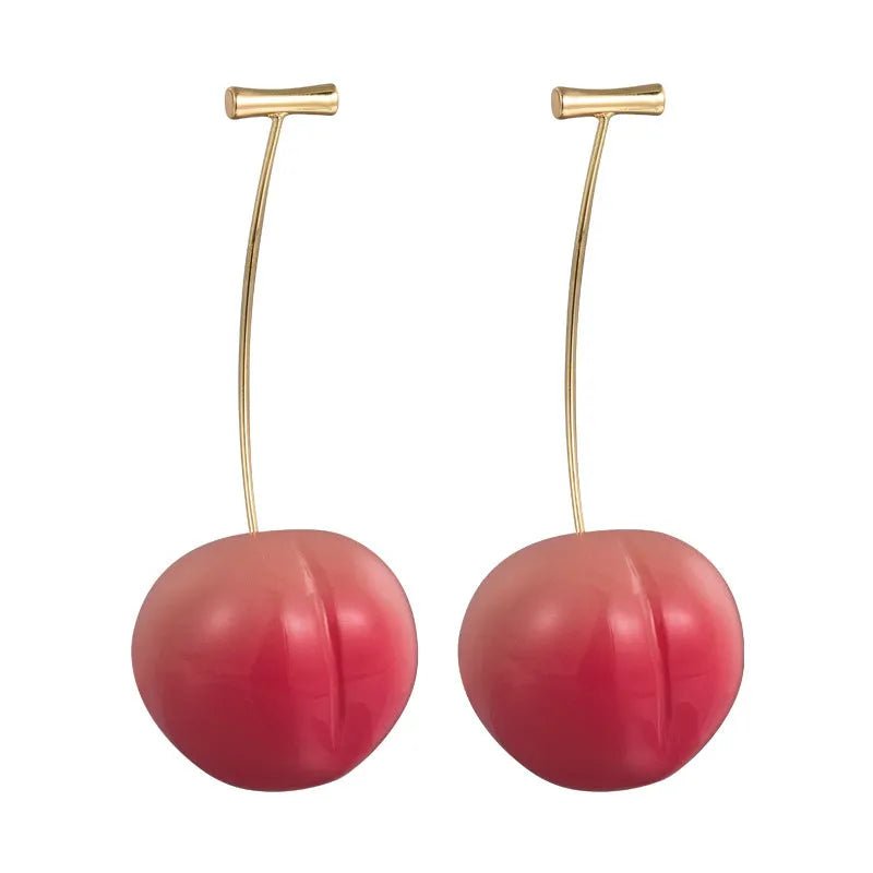 A pair of peach-shaped dangle earrings in acrylic, shown in small and large size options.