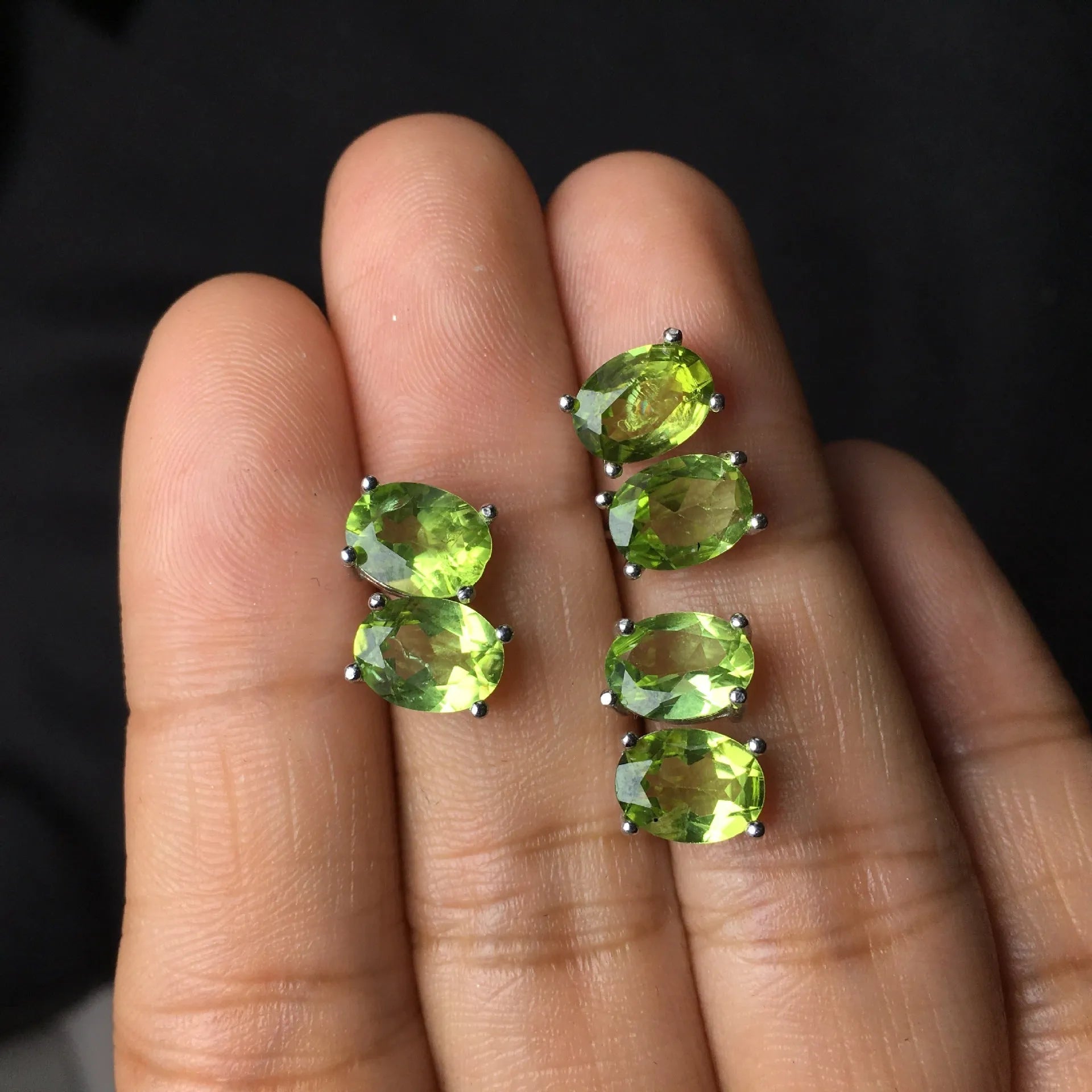 Natural grass green olivine faceted stud earrings in S925 sterling silver setting.