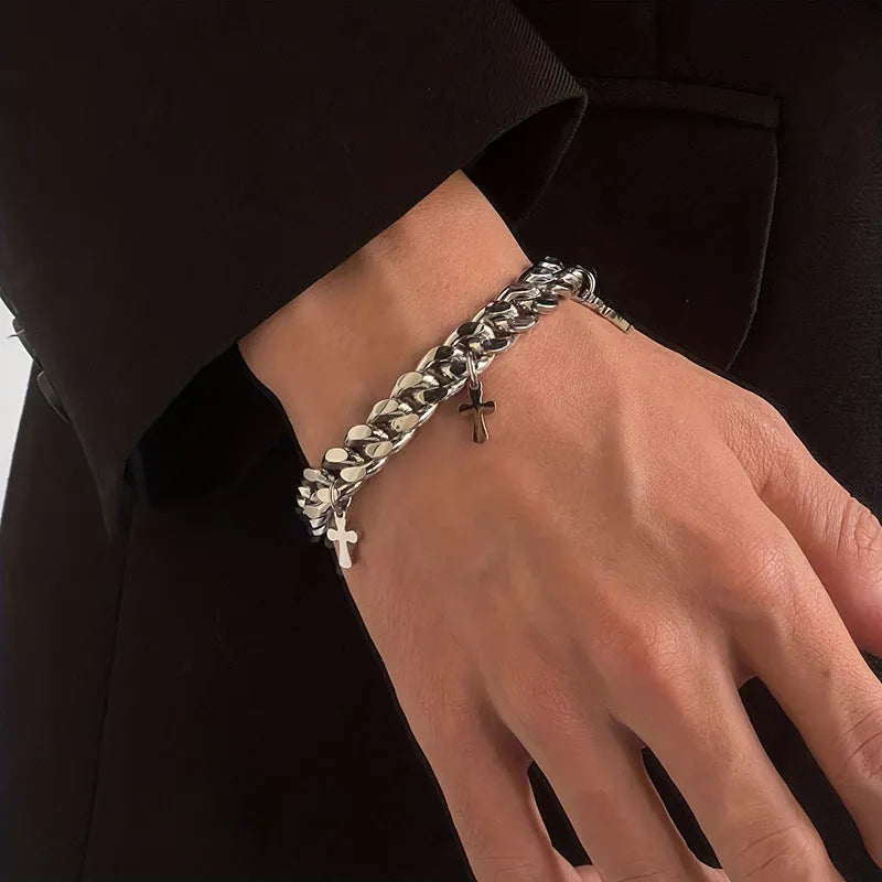 Men's titanium steel bracelet showing a geometric cross design on a simple band.